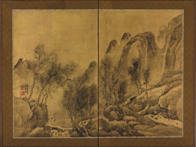 A lone traveler in a wintry mountain setting