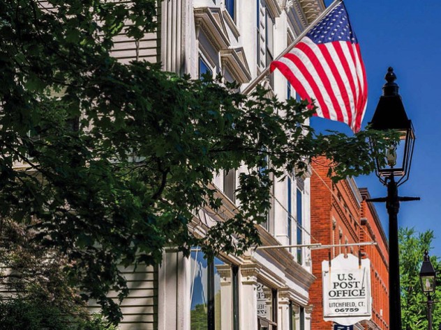Historic buildings and American flag in Litchfield, Connecticut