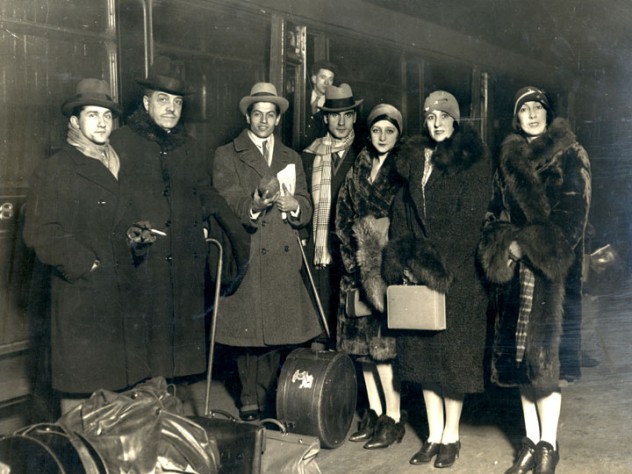 Courtesy of the Harvard Theatre Collection Diaghilev with members of the company, on tour at the train station in Liverpool, England, 1928