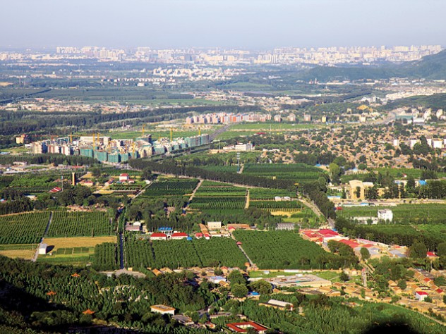 Photograph by Yu Kongjian Development sprawls ever-outward from Beijing (in background, right) toward rural Sujiatuo.