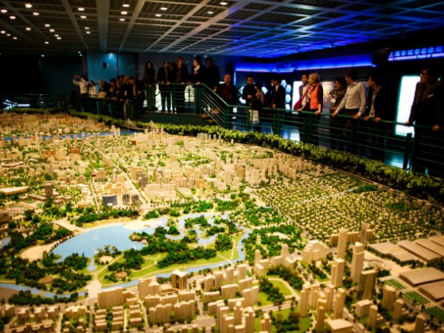 Photograph by Stephanie Mitchell/Harvard News Office President Faust and GSD dean Mostafavi take in the city model at Shanghai Urban Planning Exhibition Hall (left) on March 19.