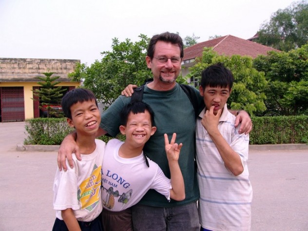 John Berlow with fellow residents of the Vietnam Friendship Village