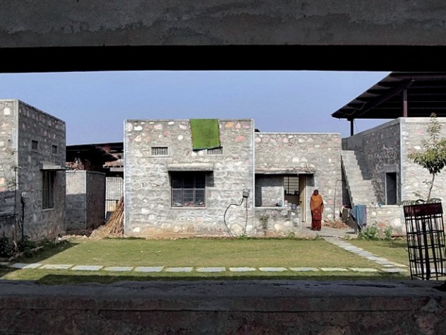 Photograph by Peter Pereira The dwellings are arranged in groups of four, oriented around a central courtyard.