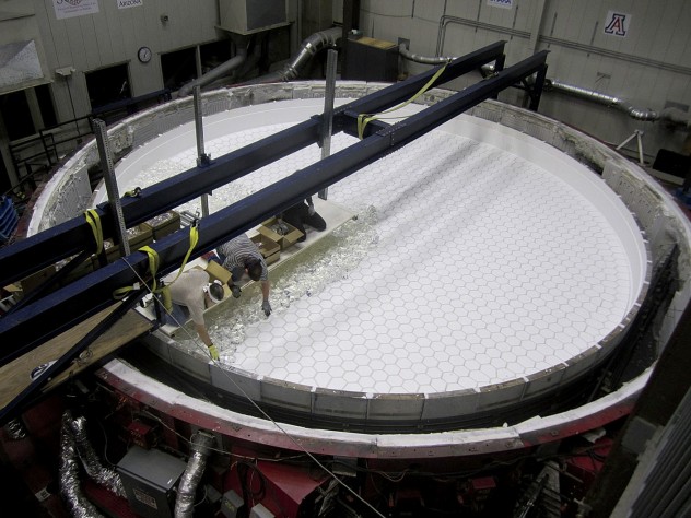 Photograph by Ray Bertram/Courtesy of the University of Arizona Steward Mirror Lab At the Steward Observatory Mirror Lab, in Tucson, staff load the rotary kiln with 20 tons of chunks of borosilicate glass.