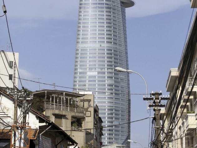 Photograph by Alex Craig/Getty Images Complete with heliport, the Bitexco Tower rises over traditional Ho Chi Minh City.