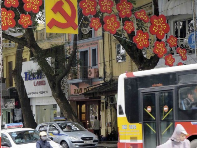 Photograph by Susan Bennett Lest anyone forget, Vietnam remains a Communist Party state, as a street decoration in central Hanoi suggests.
