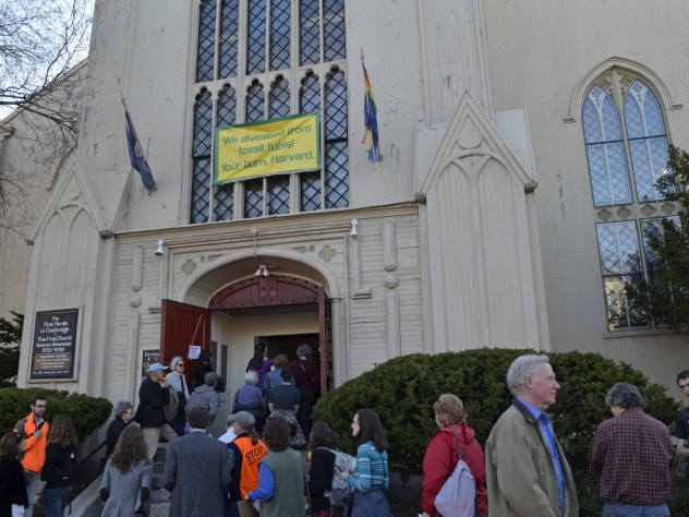 Photograph by Harvard Magazine/SG Attendees line up outside the First Parish in Cambridge for Sunday's launch event.