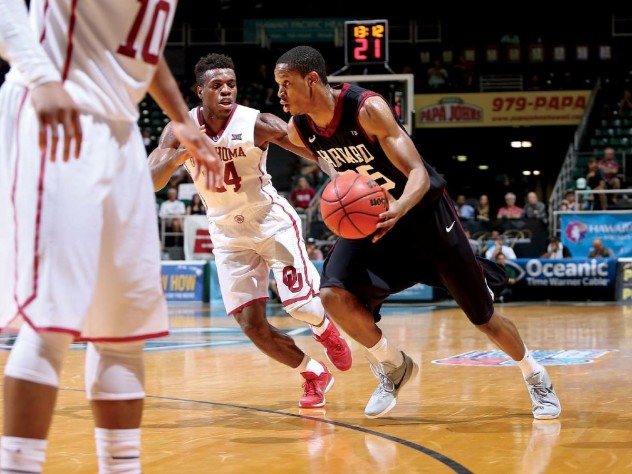 Agunwa Okolie ’16, the Ivy League Defensive Player of the Year, helped the Harvard men’s basketball team remain competitive during an injury-plagued season.