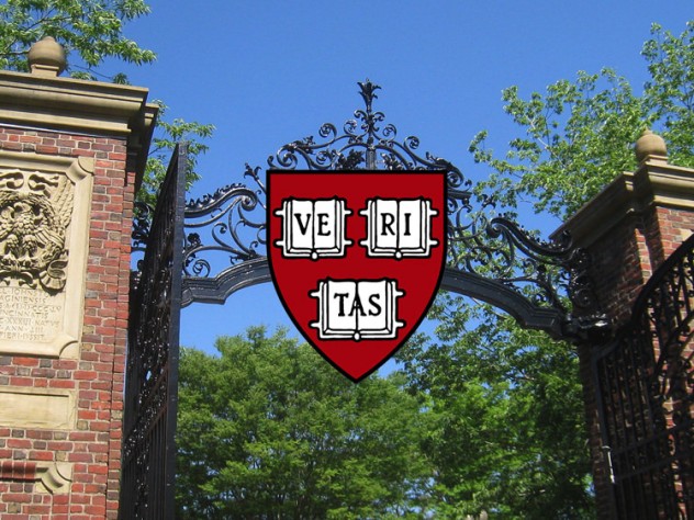 An open gate with the Harvard Logo over it