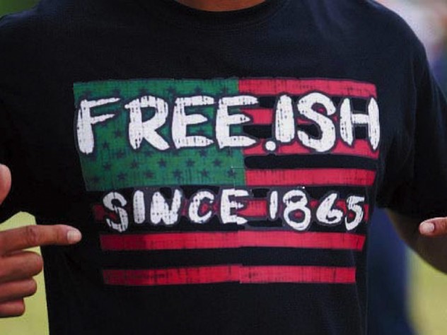Photograph of someone wearing a Juneteenth T-shirt