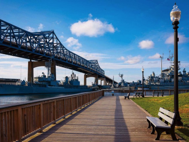 Boardwalk by Taunton River and Braga Bridge overhead