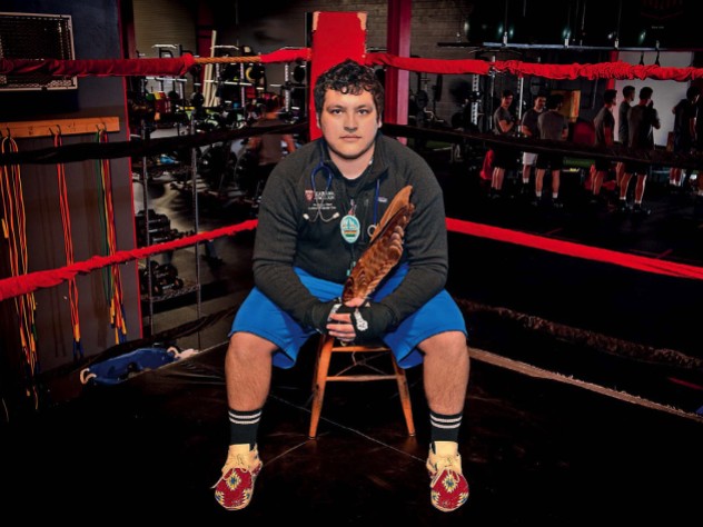 Victor A. Lopez sits in a boxing ring
