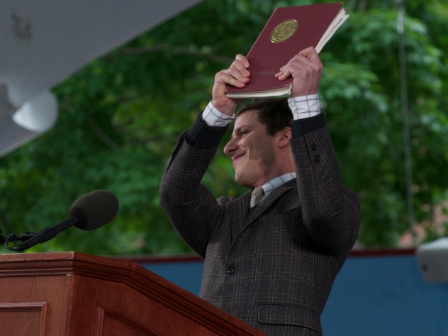 Andy Samberg holds up "the collected works of William Yates."