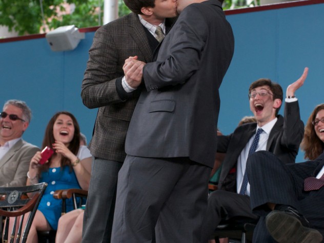 Andy Samberg kisses Matt DaSilva ’12, one of the students who introduced him, onstage as they slow-dance to Adele's "Someone Like You."             