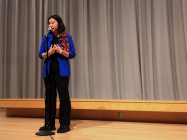 Catherine Yeo performing on stage