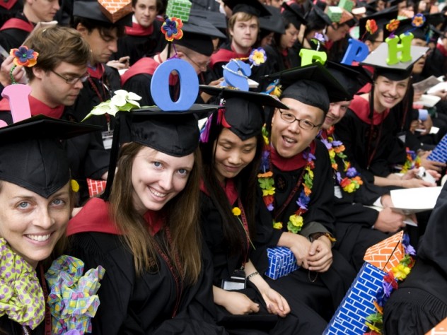 Photograph by Jim Harrison Giving a spell-out for <a href="http://harvardmagazine.com/commencement/2009-speeches">Graduate English orator Joseph Claghorn</a> were fellow landscape-architecture students Vanessa Lindley Palmer (J; the ringleader), Katie Jean Powell (O), Sisi Sun (S), Joonhyun Kim (E), Simon Mark Bussiere (P), and Adrienne Re Heflich (H). Design School students still play with blocks.