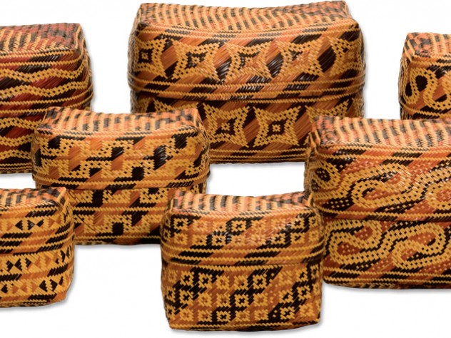 Jim Harrison Her baskets display the patterns “Worm Tracks” (rear, left and right), “Grape Skins” (rear, center), and (foreground, from left) “Bottom of Basket,” “Up Across and Down,” “Something Around,” and “Alligator Guts.”