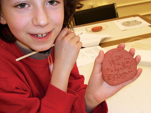 Courtesy of the Peabody Museum of Archaeology and Ethnology Do-it-yourself cuneiform at the Peabody Museum’s Wonders of Writing family event