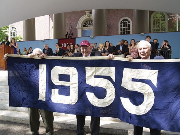 Photograph by Jim Harrison </b> The Class of 2012 has revived the "class color" tradition (see "<a href="http://harvardmagazine.com/2009/11/harvard-class-colors-and-trademark-clothing">Curious Colors</a>"); theirs is blue. On Class Day, members of the class of 1955 displayed their class banner (also blue) to honor the graduating seniors and guest speaker Barney Frank, whose College class (1961) is blue, too.
