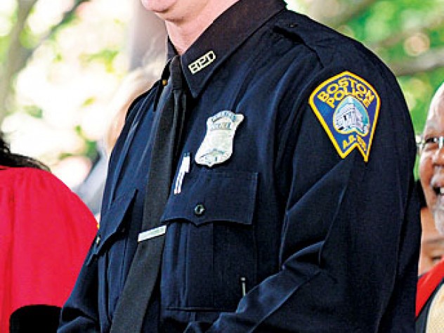  Officer Stephen McNulty sings &ldquo;The Star-Spangled Banner.&rdquo;