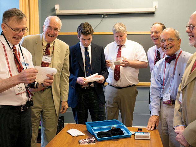 From left: David Otto, Bruce Johnson, Xandy Walsh, Alex Walsh, John Fryer, Tony Rossmann, and Paul Bamberg read letters buried in 1988. 