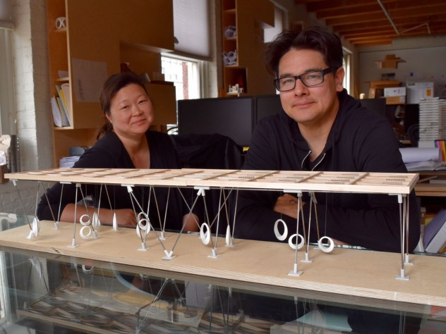 Photograph by Zara Zhang/Harvard Magazine Eric Höweler and Meejin Yoon, with a model of the swings they designed