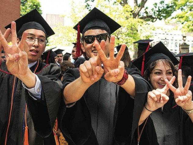 Class of 2015 First Marshal Sietse Goffard, of Bedford, Texas, with fellow class leaders Bob Wu of Sydney, Australia, Casey Fleeter, of Columbus, Ohio, and Christina Nguyen, of Irvine, California, XVing their Commencement pride