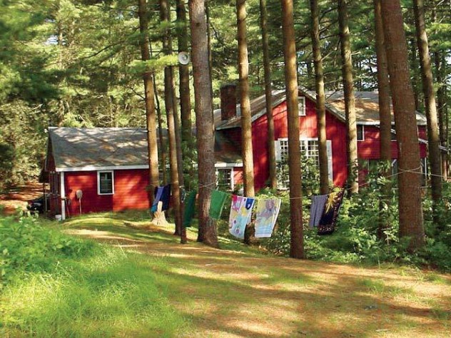 Old pines shade the rustic lodge.