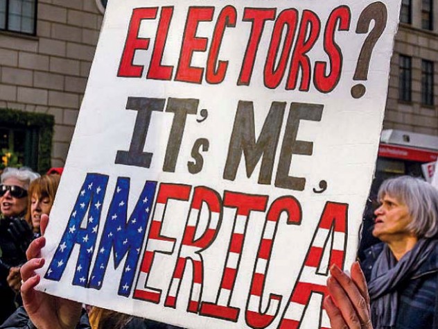 Protestors with a large poster demanding reform of the Electoral College