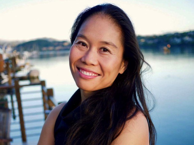 Bonnie Tsui Photo of Bonnie Tsui standing on a pier
