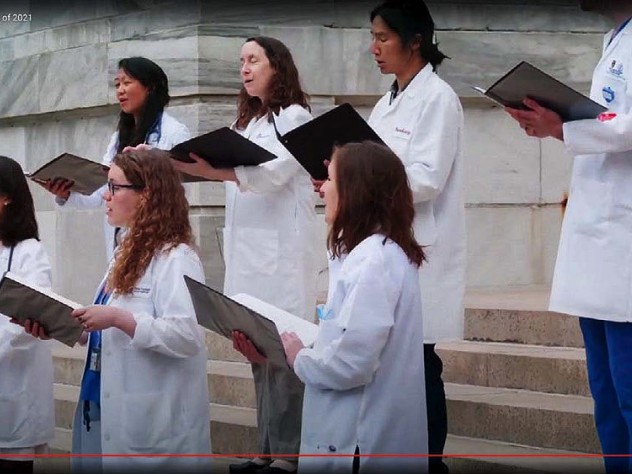 Screen shot of medical chorus singing “The Winter Is Past” honoring pandemic first responders.