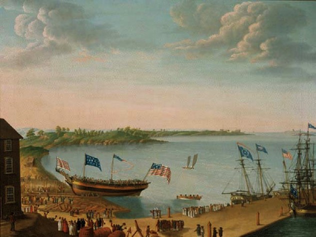 Ship launching from the shore amid blue skies
