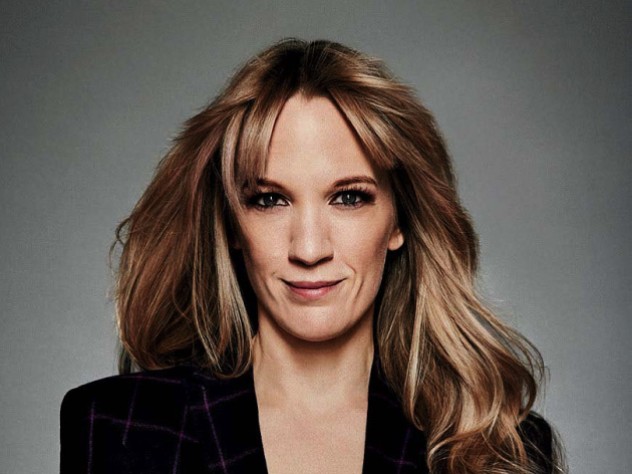 A portrait phot of Emily Carmichael