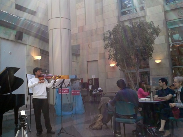 Photograph by Ricky Garza Ram Venkateswaran, of the HMS class of 2017, performs in the Tosteson Medical Education Center’s atrium last spring. He and pianist Chris Lim, HMS ’16, offered a joint program: “<i>Sicilienne</i>” (Fauré); “<i>Sicilienne</i>” (von Paradis); “Spanish Dance” (Granados/Kreisler); and <i>“Widmung</i>” (Schumann/Liszt).