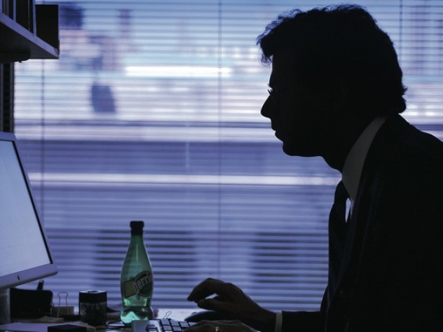 Gawande in his various environments: in his office at the Harvard School of Public Health