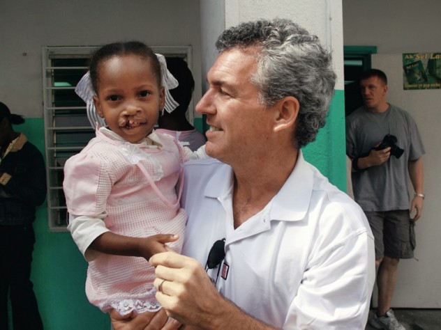Photograph courtesy of Smile Train Brian Mullaney with a Haitian patient before her surgery this past February. Smile Train has provided roughly 160 surgeries in Haiti and recently launched “Cleft-free Haiti” to completely eradicate cleft there.