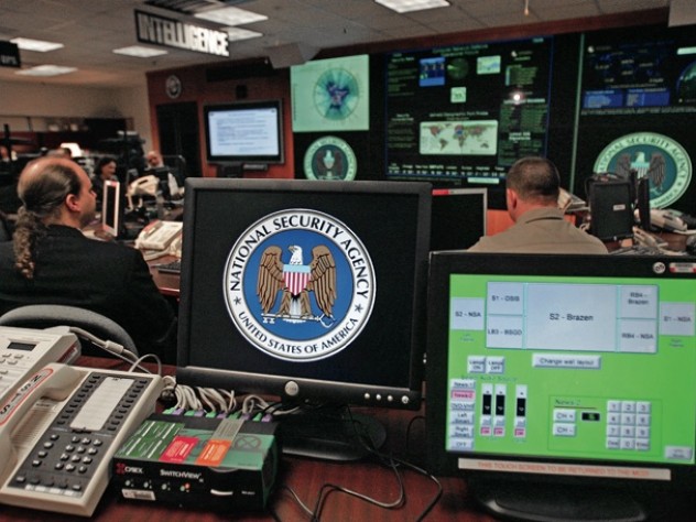 © PAUL J. RICHARDS/AFP/Getty Images Inside the National Security Agency’s Threat Operations Center in January 2006, following President George W. Bush’s speech to employees prior to the U.S. Senate hearings on domestic surveillance