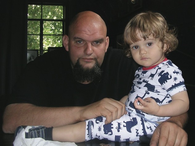 Fetterman at home with his young son, Karl