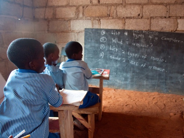 Photograph by Sara Joe Wolansky Students learn about computer skills in a classroom at Christ is the Answer Preparatory School in Adansi-Dompoase, outside Kumasi. According to school proprietor Anthony Kwasi Nyarku, private schools such as his are superior to Ghanaian public schools because the government-run schools are often under-supervised and a strong union protects the sometimes negligent teachers.