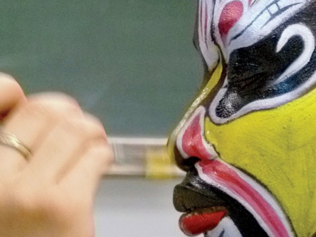Christine Shen/Harvard College Library Detail of “Painting Faces of Beijing Opera,” by Christine Shen ’12, on display in lamont library