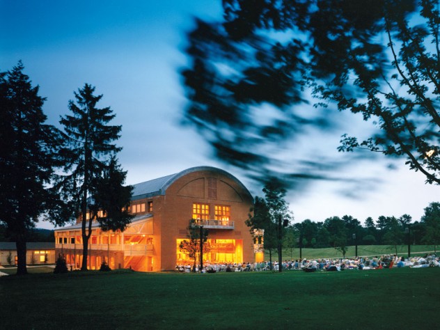Photograph ©Steve Rosenthal Seiji Ozawa Hall at Tanglewood, the summer home of the Boston Symphony Orchestra, in Lenox, Massachusetts. The hall opened in 1994. With the “barn door” open, picnickers enjoy a concert.