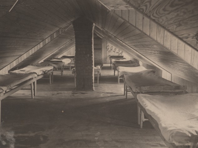 Photograph courtesy of the Harvard Art Museums <i>Crime, Children, Reform Schools: United States. New York. Freeville. George Junior Republic: George Junior Republic, Freeville, N.Y.: Cheapest Lodging for Boys, The Garret,</i> c. 1903. Gelatin silver print.