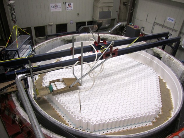 Photo by Ray Bertram, University of Arizona The kiln with 80 percent of the hexagonal blocks installed, prior to loading glass, to make the third Giant Magellan Telescope mirror blank.