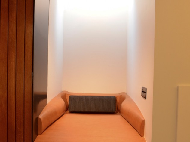 Small alcoves on the basement level boast skylights and comfortable cushions for studying and resting.