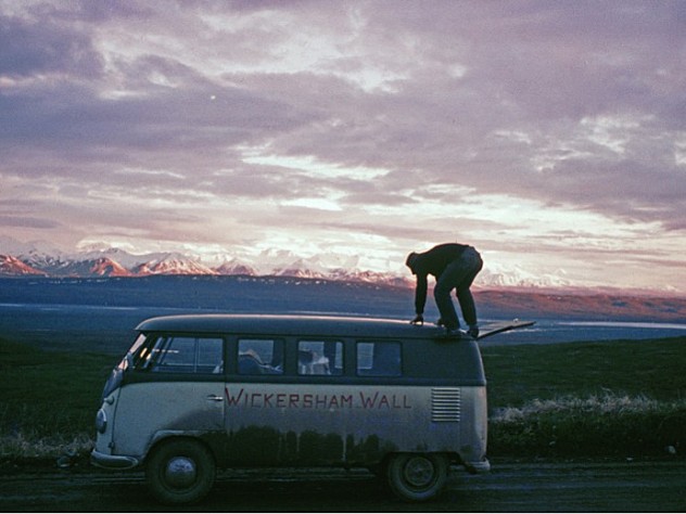 Photo courtesy of John Graham On June 18, at the first sight of Mount McKinley near Wonder Lake, Alaska, Peter Carman climbed atop the team's VW Microbus for a better look.