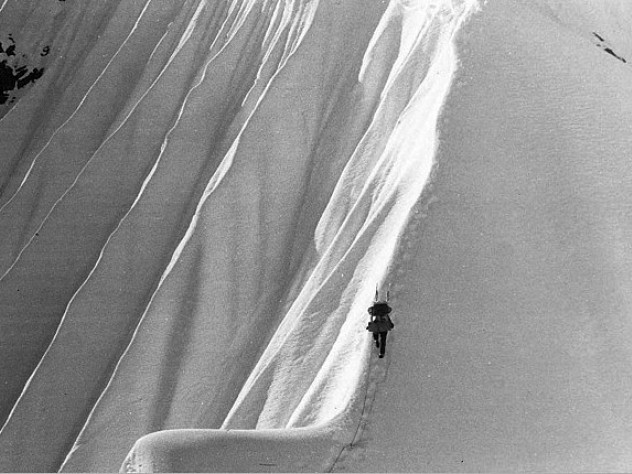 Photo courtesy of John Graham Above Camp Four, at about 8,800 feet, a Harvard climber ascends a fluted snow ridge.