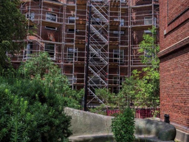 Photograph showing scaffolding for renovation of Harvard’s Adams House undergraduate residence