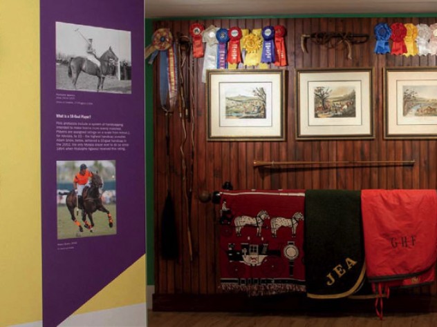 Tack-room gear like bridles, blankets, and saddles is also on display.