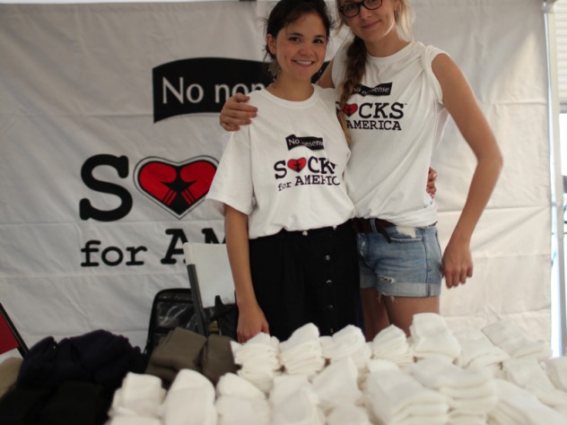 Rebecca Cooper (left) and Lily Erlinger at a Socks for America distribution event