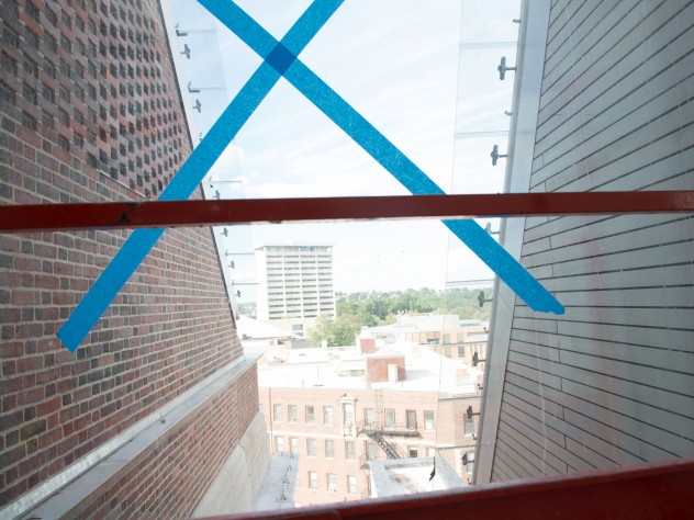 Photograph by Jim Harrison A glass “slot” separating the old Fogg building from the new admits welcome light to the interior. Brick from the old building (96 percent of its materials were ultimately recycled) was used to construct the wall seen here.